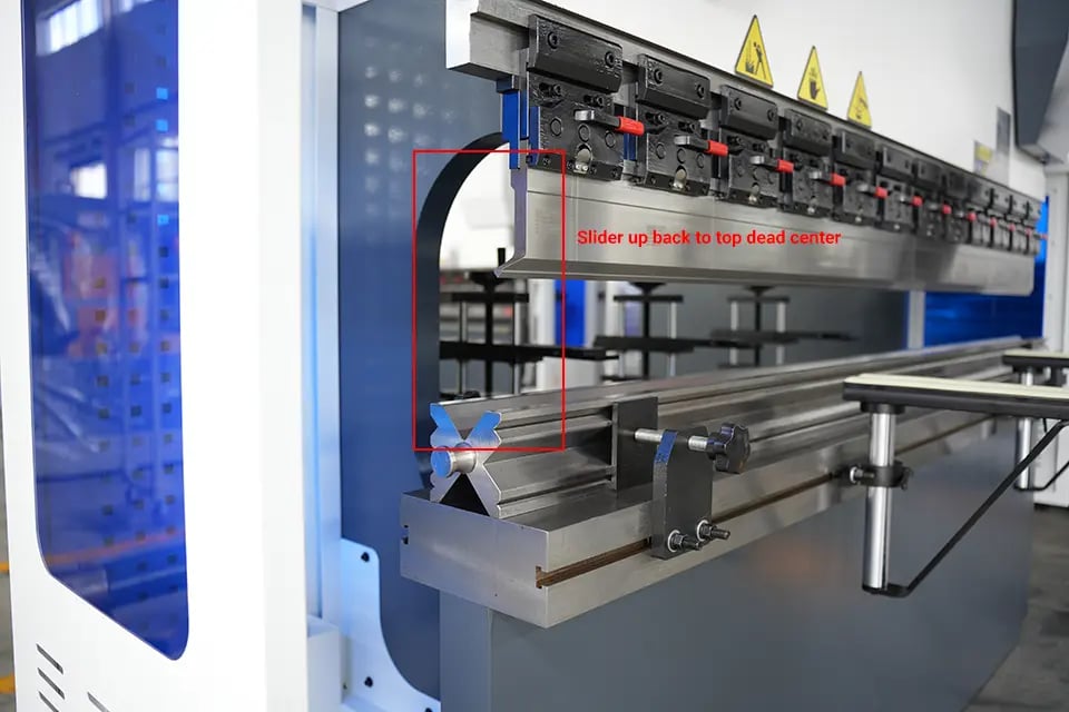 Slider up back to top dead center