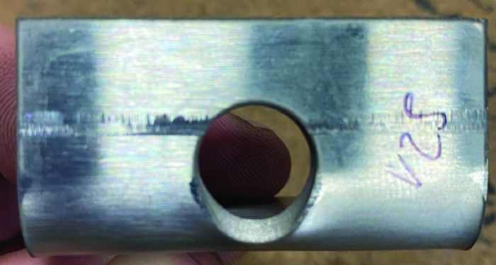 Fig. 1 - One of the most common problems a press brake operator encounters is deformation of a feature, such as a hole, that resides too close to the bend line. As sheet metal folds, the bend line will tend to flow toward the area of least resistance.