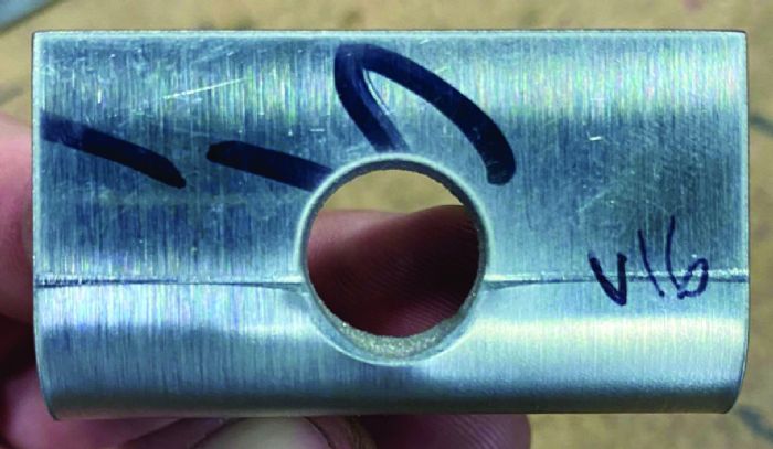 Fig. 5 - Here, a 0.630-in.-thick, 88-deg. V die was used. This minimized the deformation but did not eliminate it.