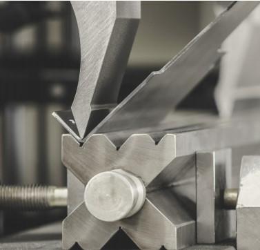 The fundamentals of press brake tooling - Pictures 12 Figure 12 The operator may choose from a variety of die-opening alternatives with this four-way die.